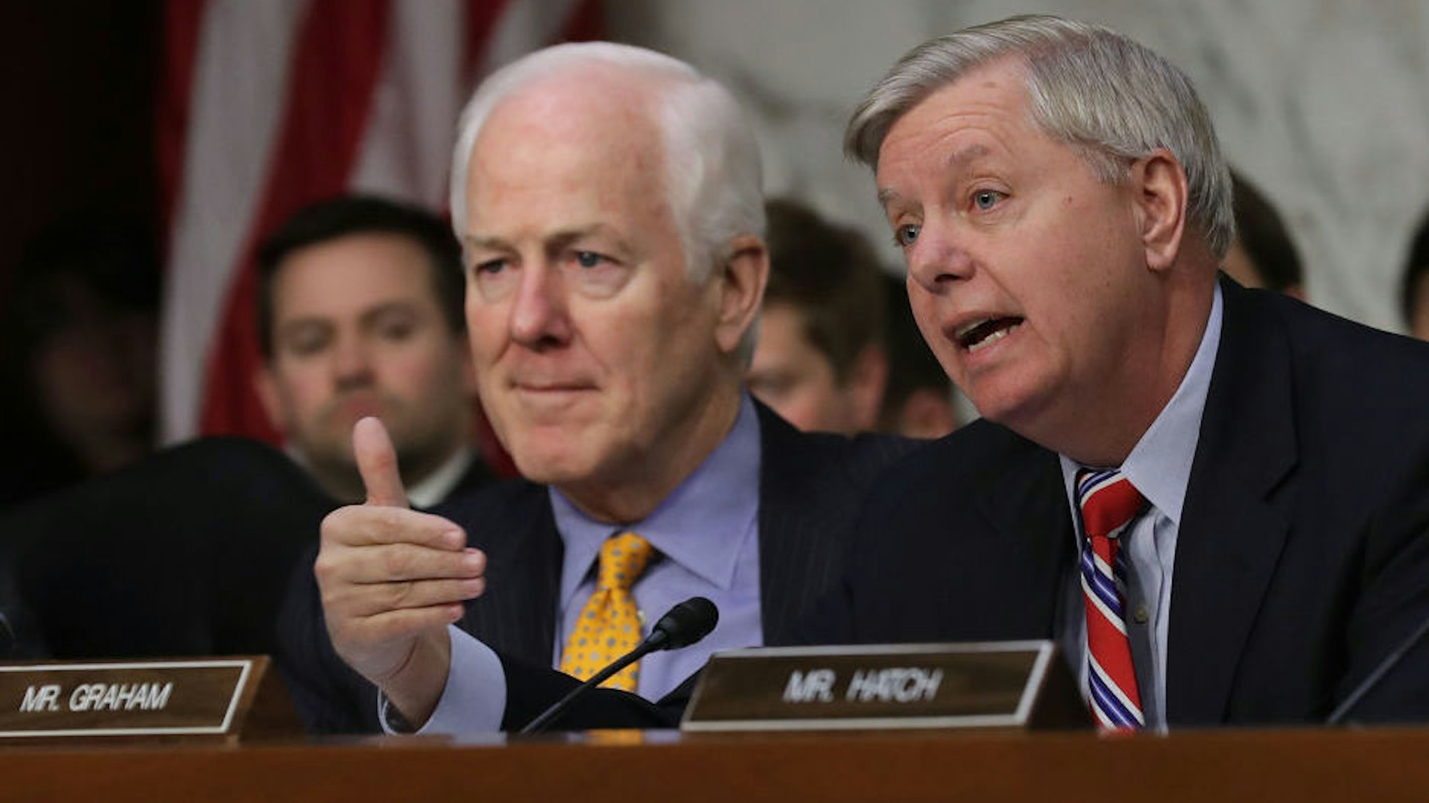 Senate Judiciary Committee member Sen. Lindsey Graham (R-SC) (R) delivers an opening statement with Sen. John Cornyn (R-TX) during Judge Neil Gorsuch's Supreme Court confirmation hearing in the Hart Senate Office Building on Capitol Hill March 20, 2017 in Washington, DC.