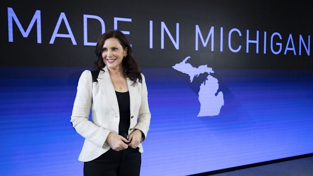 Michigan Governor Gretchen Whitmer poses for a photo after an event at which General Motors announced they are making a $7 billion investment, the largest in the company's history, in electric vehicle and battery production in the state of Michigan on January 25, 2022 in Lansing, Michigan.