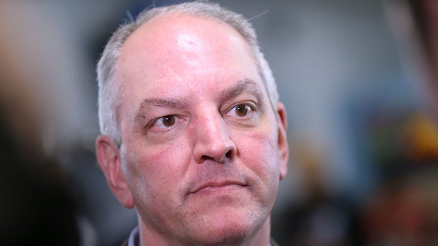 NEW ORLEANS, LOUISIANA - NOVEMBER 15: Gov. John Bel Edwards talks to media at the Case Closed Barbershop on November 15, 2019 in New Orleans, Louisiana. Louisiana residents head to the polls tomorrow to vote in the gubernatorial runoff election between Republican candidate Eddie Rispone and incumbent Democratic Gov. John Bel Edwards.