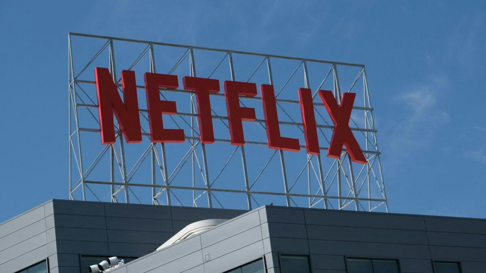 The Netflix logo is seen on top of their office building in Hollywood, California, March 2, 2022