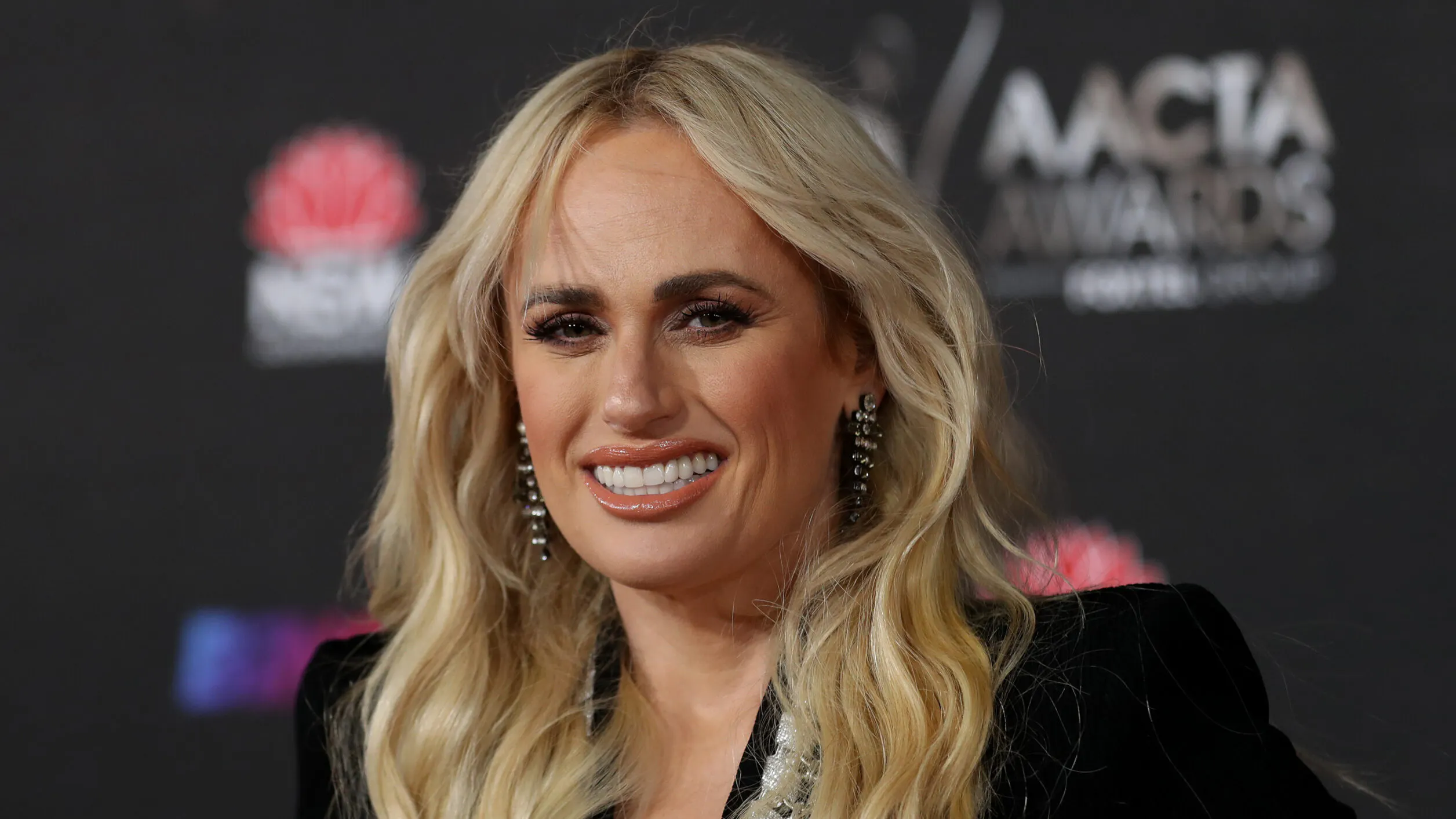 Columnist Apologizes To Rebel Wilson Over ‘Outing’ Controversy, Paper Removes Article That Exposed Plans