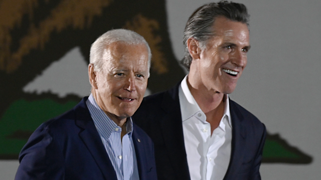 LONG BEACH, CA - SEPTEMBER 13: President Joe Biden and Governor Gavin Newsom enter the stage at Long Beach City College on the final day of campaigning against the recall in Long Beach on Monday, September 13,2021