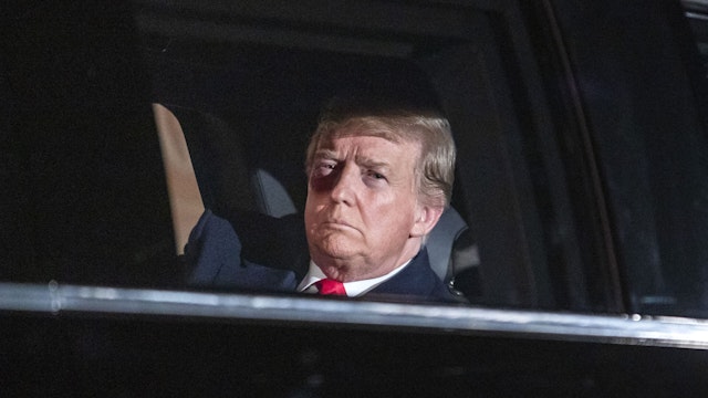 WASHINGTON, DC - FEBRUARY 5: U.S. President Donald Trump sits in the presidential limo as he departs the White House for Capitol Hill, where he will deliver his second State of the Union speech, on February 5, 2019 in Washington, DC. President Trump's second State of the Union address was postponed one week due to the partial government shutdown.