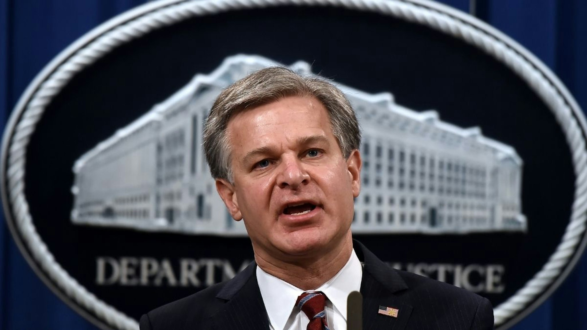 Federal Bureau of Investigation Director Christopher Wray announces significant law enforcement actions related to the illegal sale of drugs and other illicit goods and services on the Darknet during a press conference at the Department of Justice September 22, 2020 in Washington, DC.