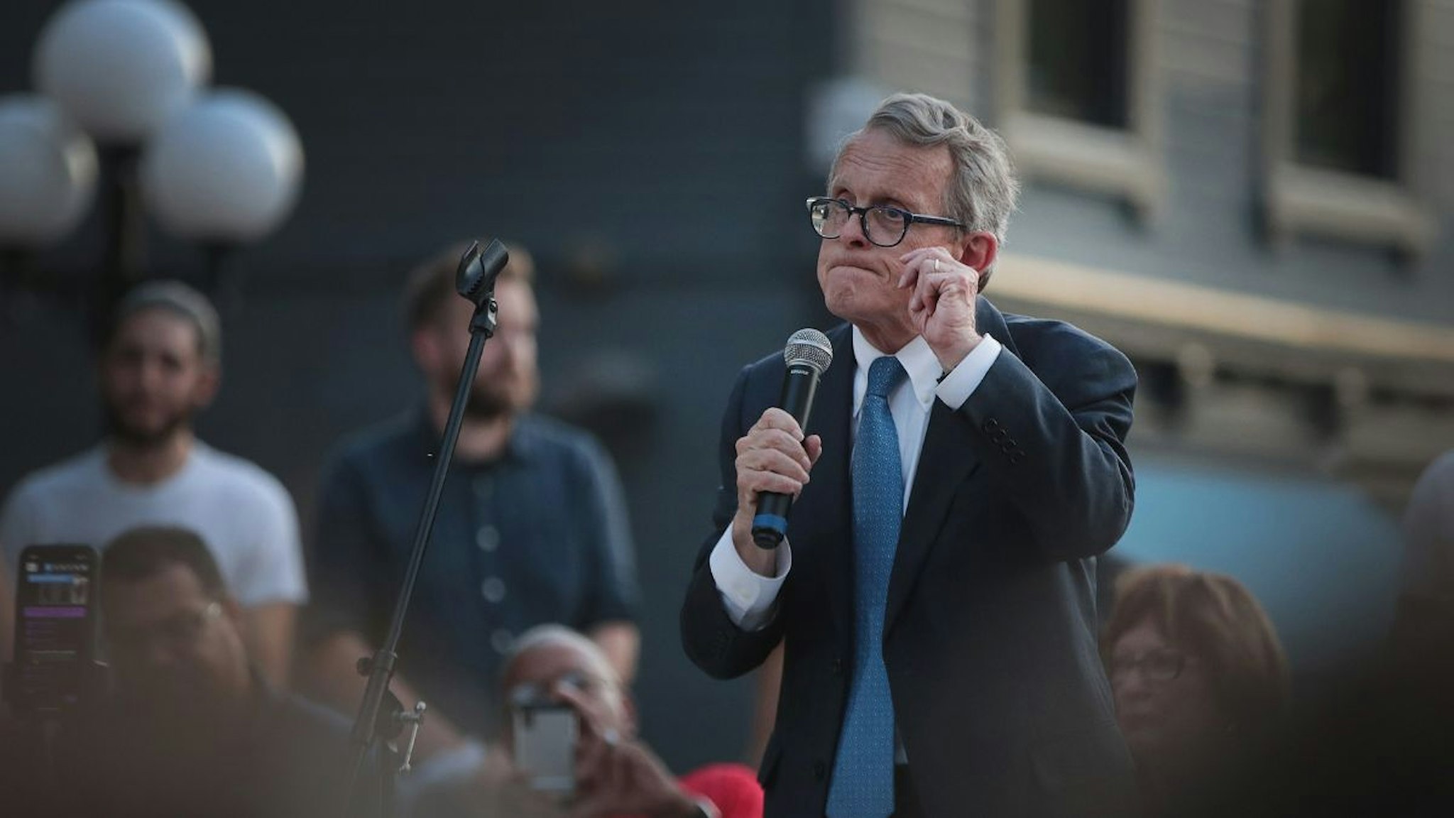 Ohio Governor Mike DeWine speaks to mourners at a memorial service in the Oregon District held to recognize the victims of an early-morning mass shooting in the popular nightspot on August 04, 2019 in Dayton, Ohio.