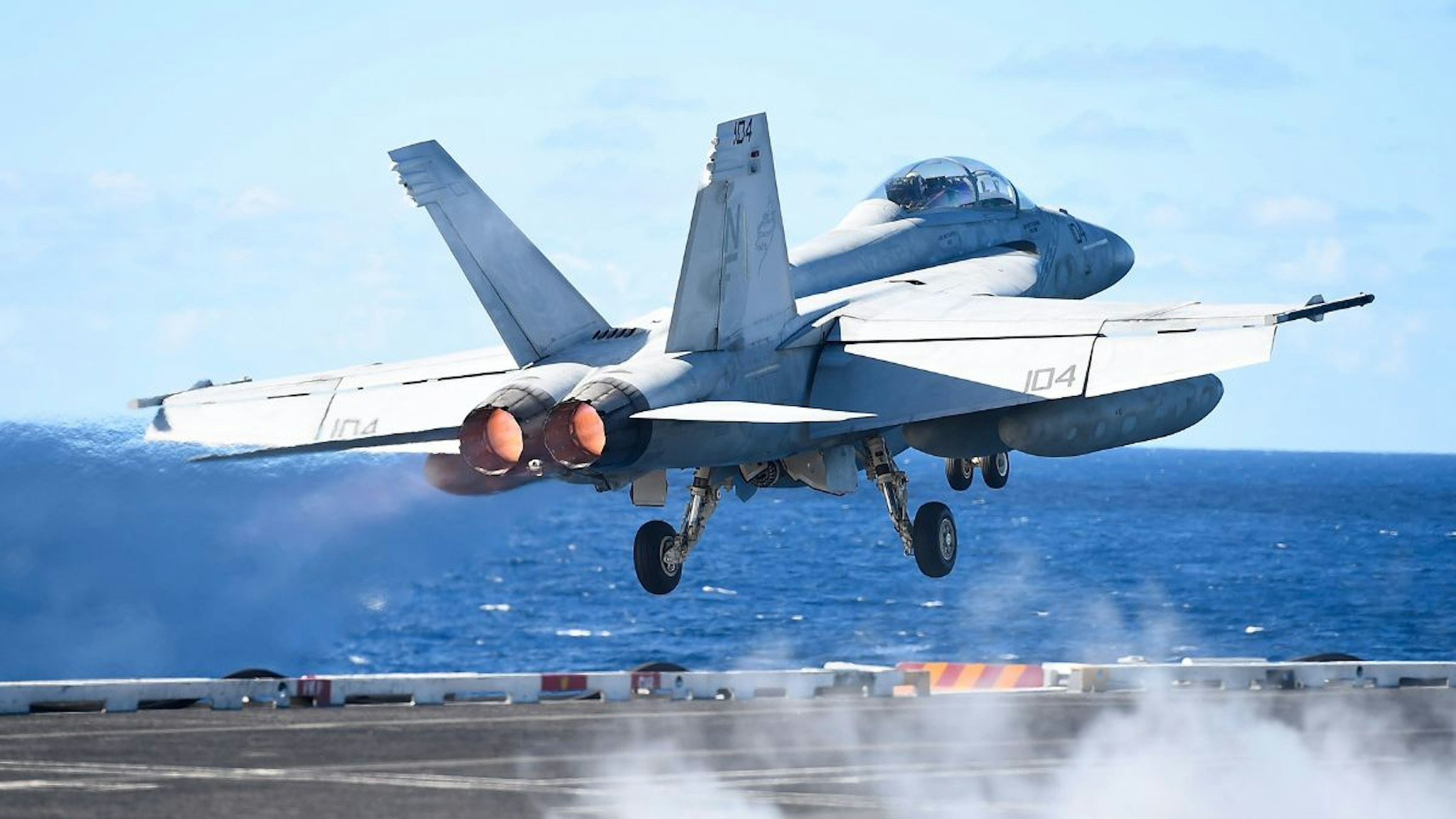 A US Navy Super Hornet takes off from the deck of the USS Ronald Reagan on July 14, 2017 in Townsville, Australia.