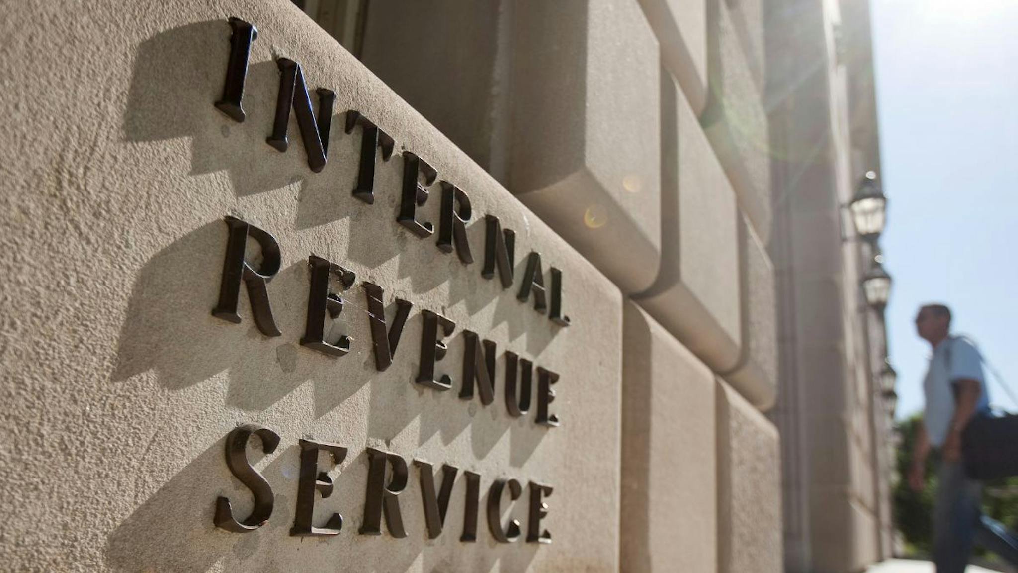 IRS A man enters the Internal Revenue Service (IRS) building in Washington, D.C., U.S., on Friday, May 7, 2010.