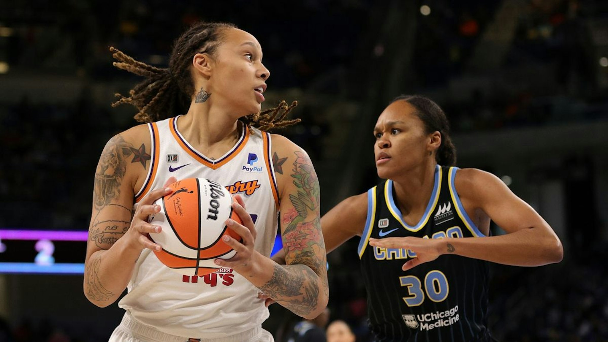 Brittney Griner #42 of the Phoenix Mercury is defended by Azurá Stevens #30 of the Chicago Sky during the first half of Game Four of the WNBA Finals at Wintrust Arena on October 17, 2021 in Chicago, Illinois
