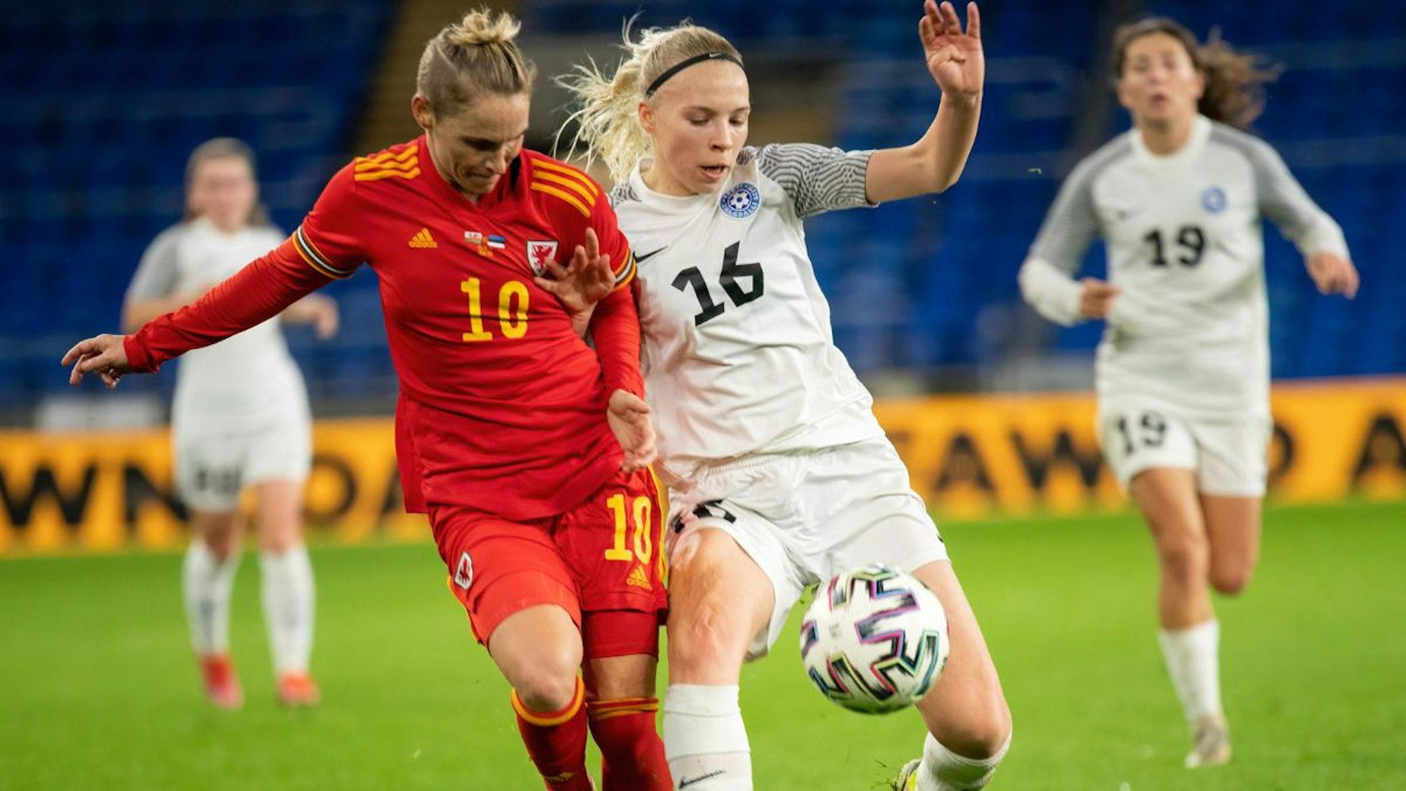 Jessica Fishlock (No.10) of Wales, and Sandra Liir (No.16) of Estonia in action during the FIFA Women's World Cup Qualifying match between Wales and Estonia at Cardiff City Stadium.