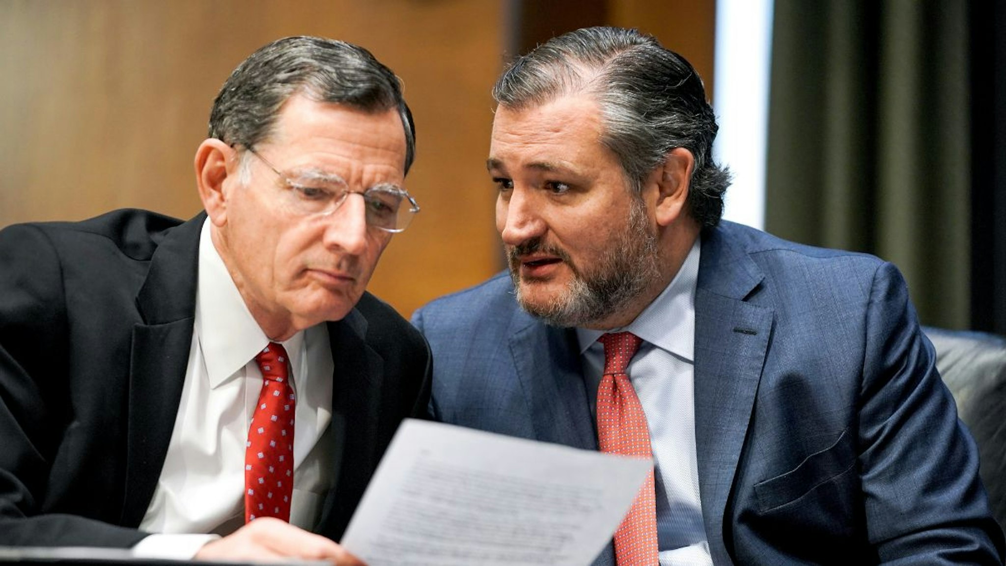 Sen. John Barrasso (R-WY) and Sen. Ted Cruz (R-TX) talk at the confirmation hearing for Samantha Power, nominee to be Administrator of the U.S. Agency for International Development, before the Senate Foreign Relations Committee on March 23, 2021 on Capitol Hill in Washington, DC.