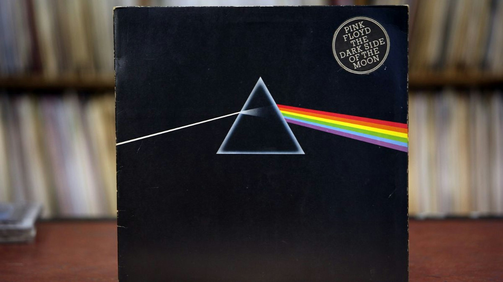 A vinyl LP for "Dark Side of the Moon" by Pink Floyd, a band signed to the EMI music label, sits on display at a record store in London, U.K., on Wednesday, Feb. 2, 2011.