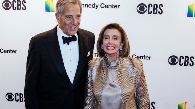 Speaker of the US House of Representatives Nancy Pelosi (R) and husband Paul Pelosi attend the 44th Kennedy Center Honors at the Kennedy Center in Washington, DC, on December 5, 2021.