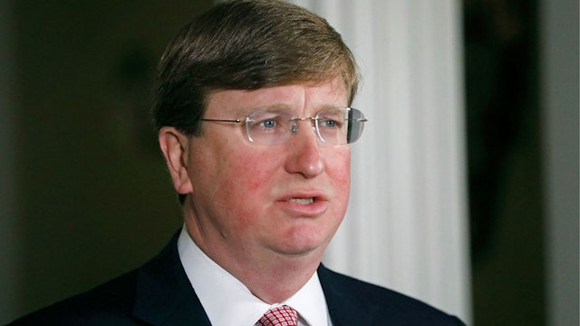 Mississippi Republican Gov. Tate Reeves delivers a televised address prior to signing a bill retiring the last state flag with the Confederate battle emblem during a ceremony at the Governor's Mansion in Jackson, Mississippi, on June 30, 2020.