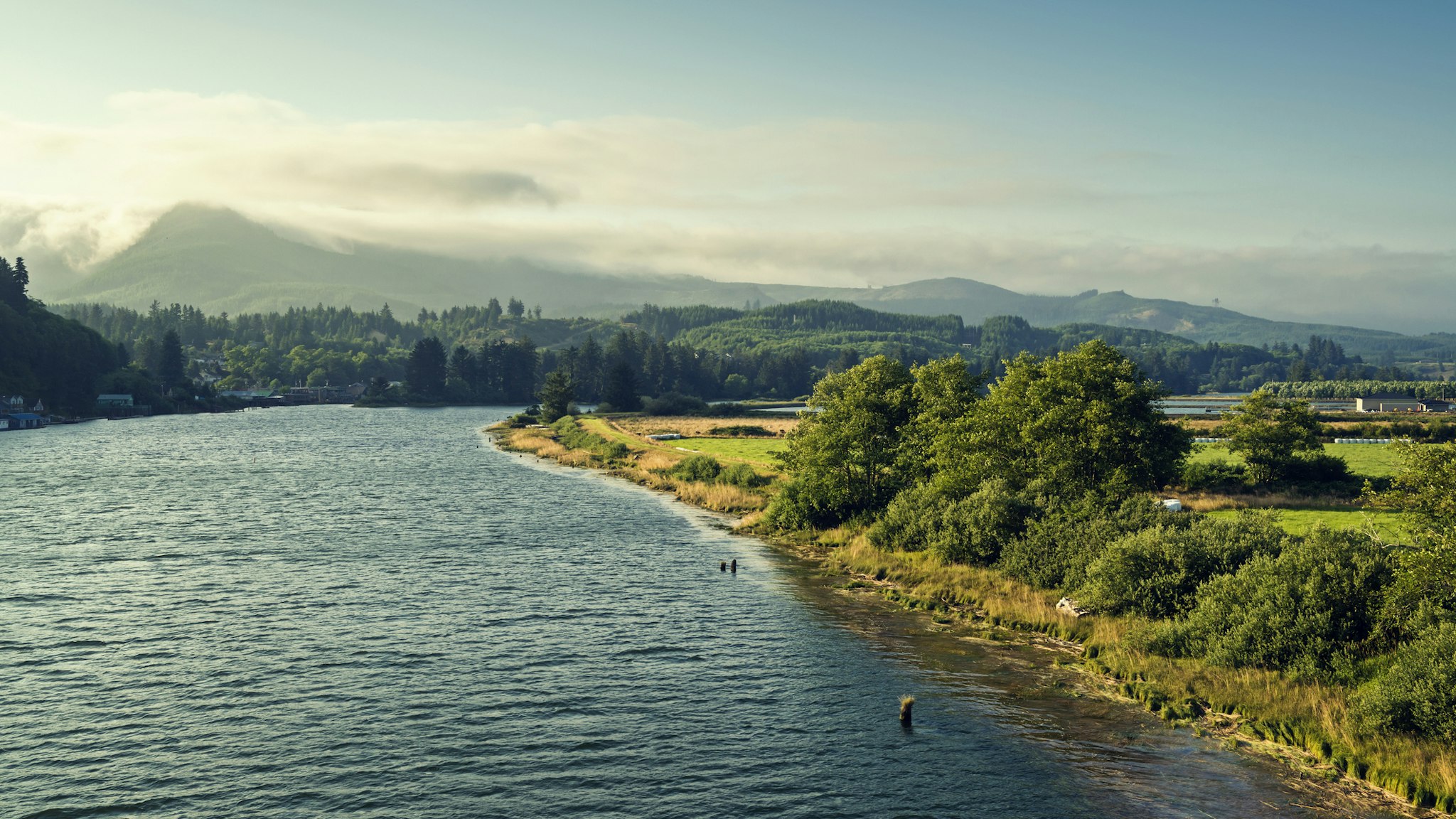 "Small river that runs through Nehalem, Oregon to Pacific Ocean.Shot in the late afternoon from hwy 101."