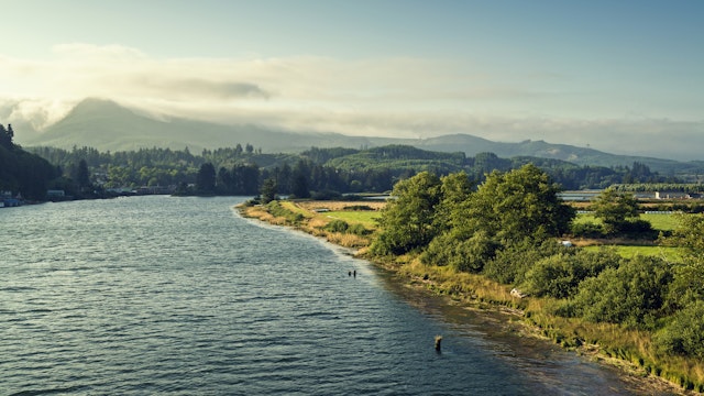 "Small river that runs through Nehalem, Oregon to Pacific Ocean.Shot in the late afternoon from hwy 101."