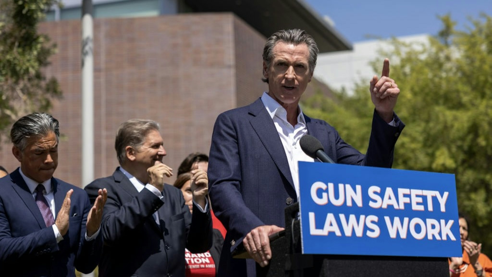 California Gov. Newsom Highlights New State Efforts To Stem Gun Violence LOS ANGELES, CA - JULY 22: California Attorney General Rob Bonta (L) and Senate Majority Leader Emeritus Bob Hertzberg applaud as California governor Gavin Newsom address a news conference where he signed SB 1327 into law on July 22, 2022 in Los Angeles, California. During the conference, Newsom signed SB 1327, which allows private individuals to sue one another for the illegal manufacture or sale of guns in California, using the principal that the Supreme Court allows for Texas in pursuing people who have had or helped in an abortion. Following a series of high-profile mass shootings across the nation, the governor has signed a set of bills establishing laws meant to reduce gun violence. Included are laws restricting ghost guns, a 10-year prohibition on gun possession for individuals convicted of child or elder abuse, and prohibiting gun the industry from advertising to minors. Gun violence is the leading cause of death among children in the U.S., and in Los Angeles, 30 percent of shootings involve ghost guns. (Photo by David McNew/Getty Images) David McNew / Contributor