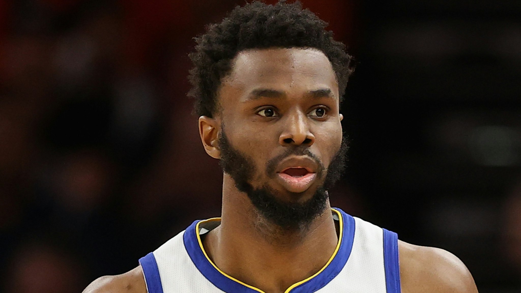 Andrew Wiggins #22 of the Golden State Warriors handles the ball during the first half of the NBA game at Footprint Center on November 30, 2021 in Phoenix, Arizona.