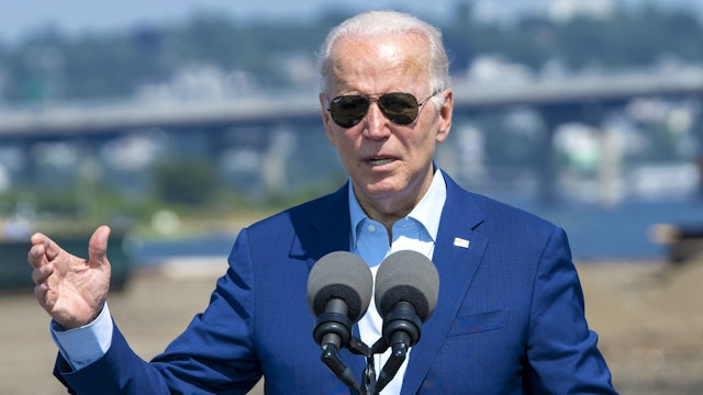 US President Joe Biden speaks at the former Brayton Point Power Station in Somerset, Massachusetts, US, on Wednesday, July 20, 2022. Biden announced executive action to confront climate change, including plans to steer federal dollars to heat-ravaged communities, though he's holding off for now on an emergency decree that would allow him to marshal sweeping powers against global warming.