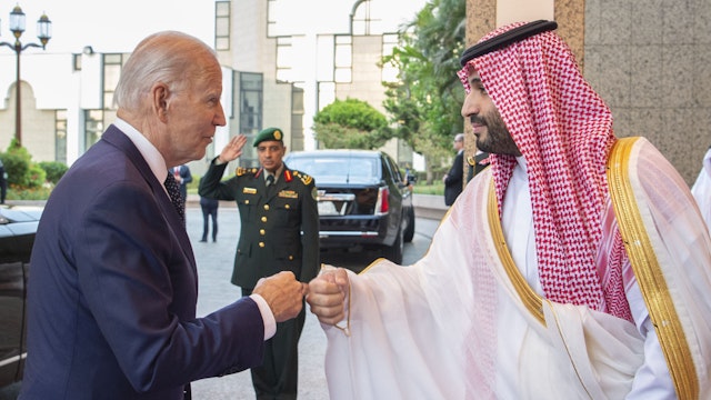 JEDDAH, SAUDI ARABIA - JULY 15: (----EDITORIAL USE ONLY â MANDATORY CREDIT - "ROYAL COURT OF SAUDI ARABIA / HANDOUT" - NO MARKETING NO ADVERTISING CAMPAIGNS - DISTRIBUTED AS A SERVICE TO CLIENTS----) US President Joe Biden (L) being welcomed by Saudi Arabian Crown Prince Mohammed bin Salman (R) at Alsalam Royal Palace in Jeddah, Saudi Arabia on July 15, 2022.
