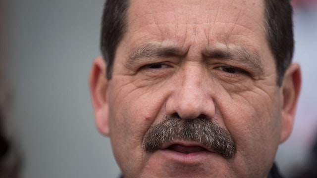 Chicago Mayoral candidate Jesus "Chuy" Garcia speaks to the press after casting his ballot on election day February 24, 2015 in Chicago, Illinois