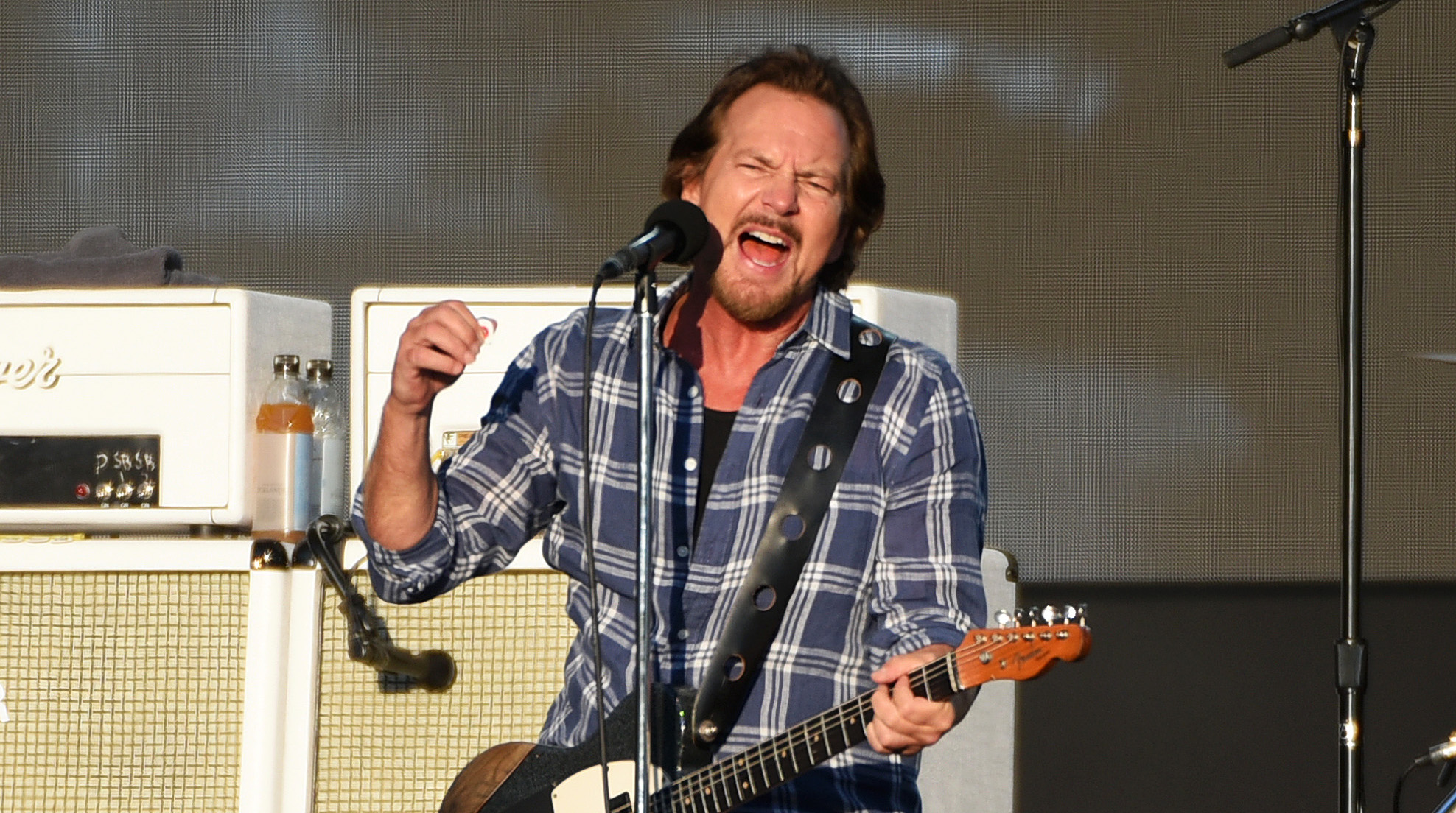 Pearl Jam’s Frontman Interrupts Show to Criticize Harrison Butker