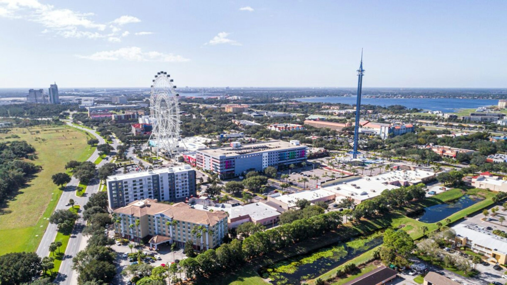 Florida, aerial view of The Wheel at ICON Park, Orlando Star flyer swing, amusement park ride.
