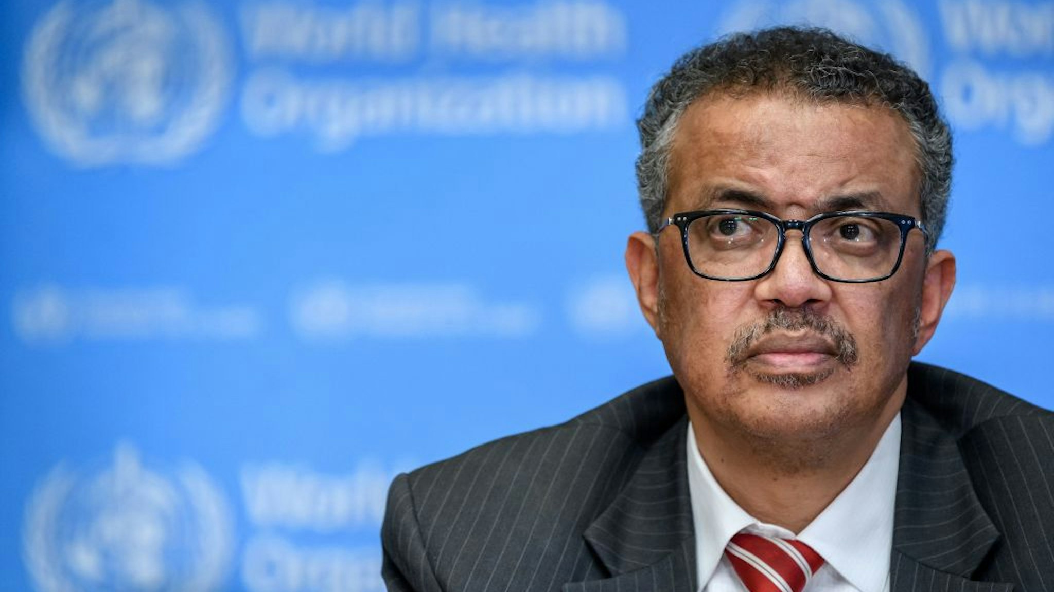 TOPSHOT - EDITORS NOTE: Graphic content / World Health Organization (WHO) Director-General Tedros Adhanom Ghebreyesus attends a daily press briefing on COVID-19 virus at the WHO headquarters in Geneva on March 11, 2020. - WHO Director-General Tedros Adhanom Ghebreyesus announced on March 11, 2020 that the new coronavirus outbreak can now be characterised as a pandemic. (Photo by Fabrice COFFRINI / AFP)