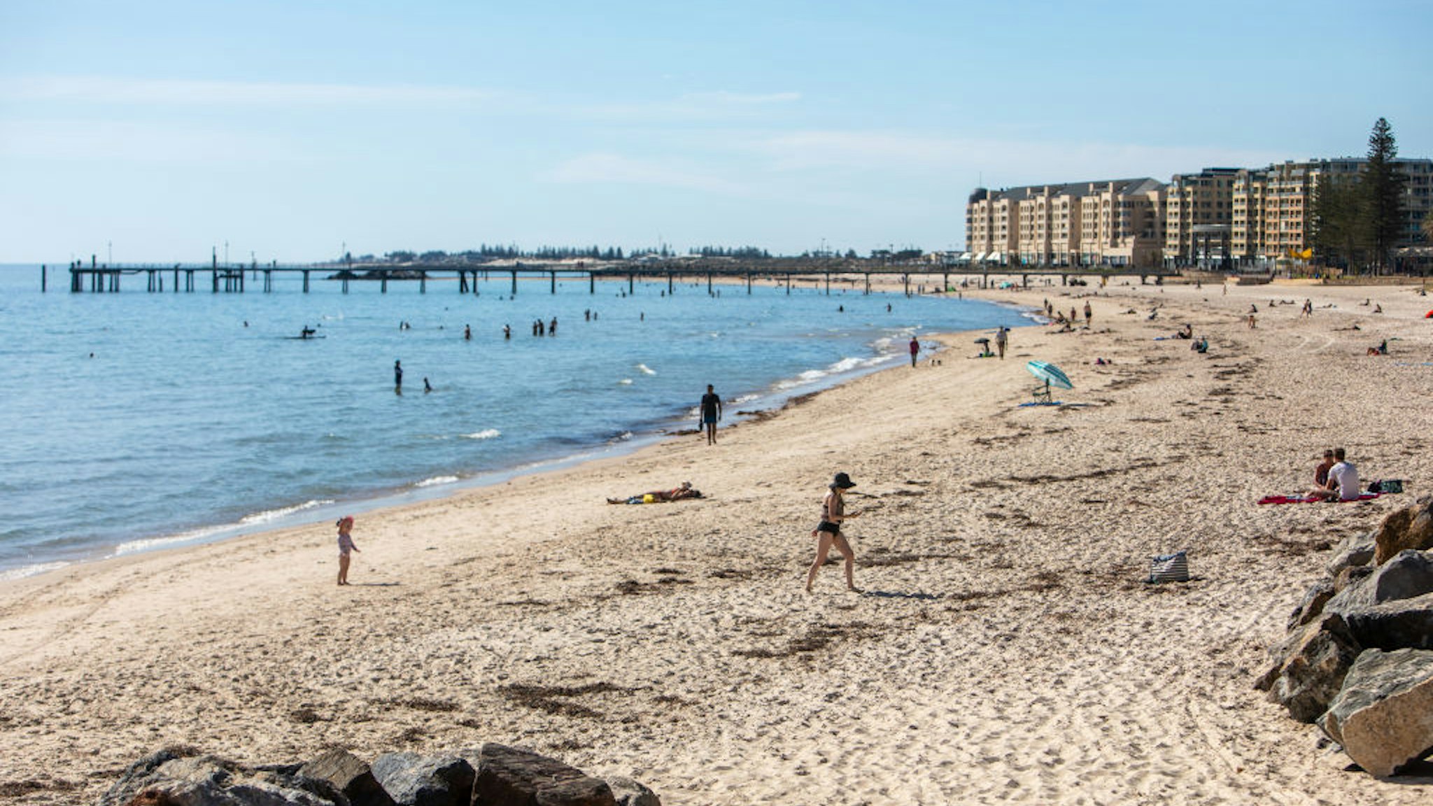 Seacliff Surf Lifesavers make a public announcement from SA Police regarding keeping social distancing of 1.5m during the Corona Virus pandemic on Somerton Park Beach on March 28, 2020 in Adelaide, Australia.