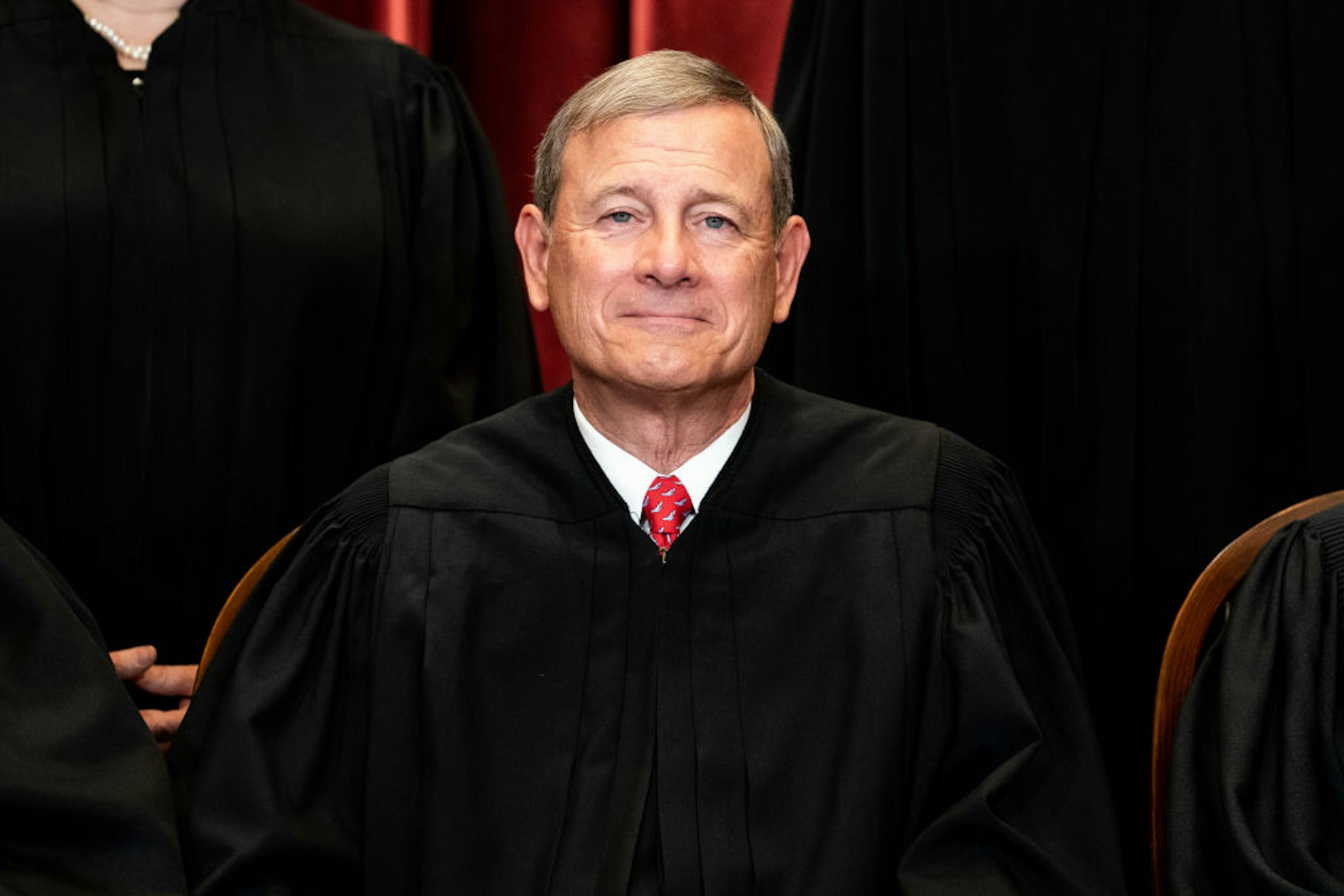 WASHINGTON, DC - APRIL 23: Chief Justice John Roberts sits during a group photo of the Justices at the Supreme Court in Washington, DC on April 23, 2021. (Photo by Erin Schaff-Pool/Getty Images)