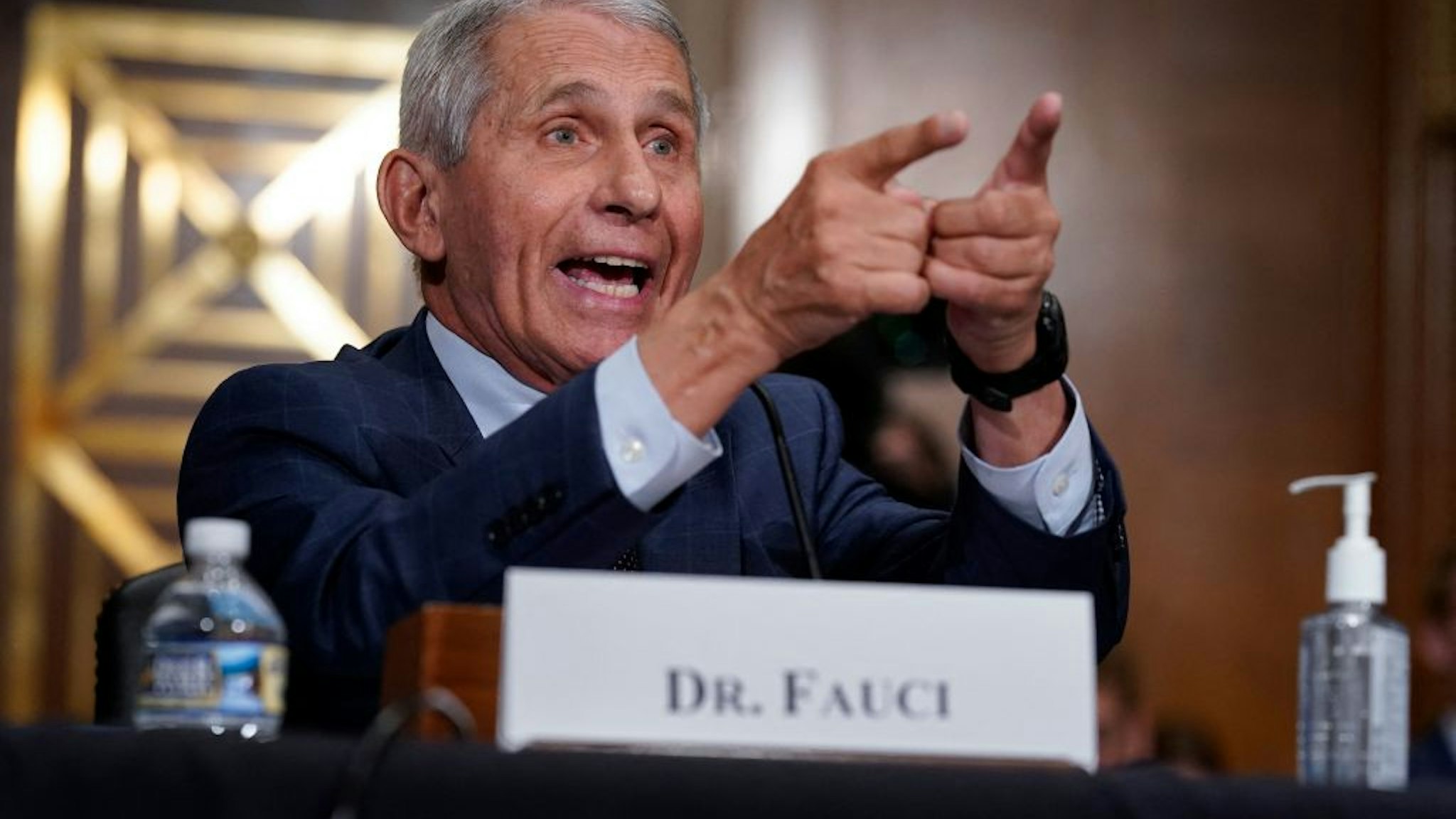 Dr. Anthony Fauci responds to accusations by Sen. Rand Paul, R-KY, as he testifies during the Senate Health, Education, Labor, and Pensions Committee hearing on Capitol Hill in Washington,DC on July 20, 2021. (Photo by J. Scott Applewhite / POOL / AFP) (Photo by J. SCOTT APPLEWHITE/POOL/AFP via Getty Images)