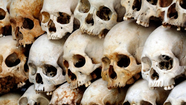 The Killing Fields, Human Skulls at Choeung Ek Genocide Memorial, Cambodia. (Photo by: Bob Henry/UCG/Universal Images Group via Getty Images)