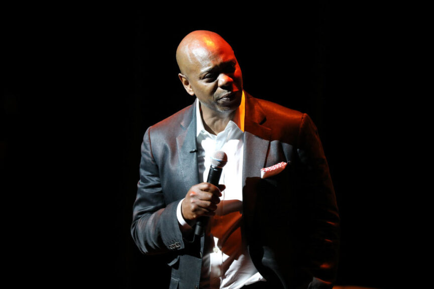 WASHINGTON, DC - JUNE 20: Dave Chappelle speaks onstage during the Dave Chappelle theatre dedication ceremony at Duke Ellington School of the Arts on June 20, 2022 in Washington, DC. (Photo by Brian Stukes/WireImage)
