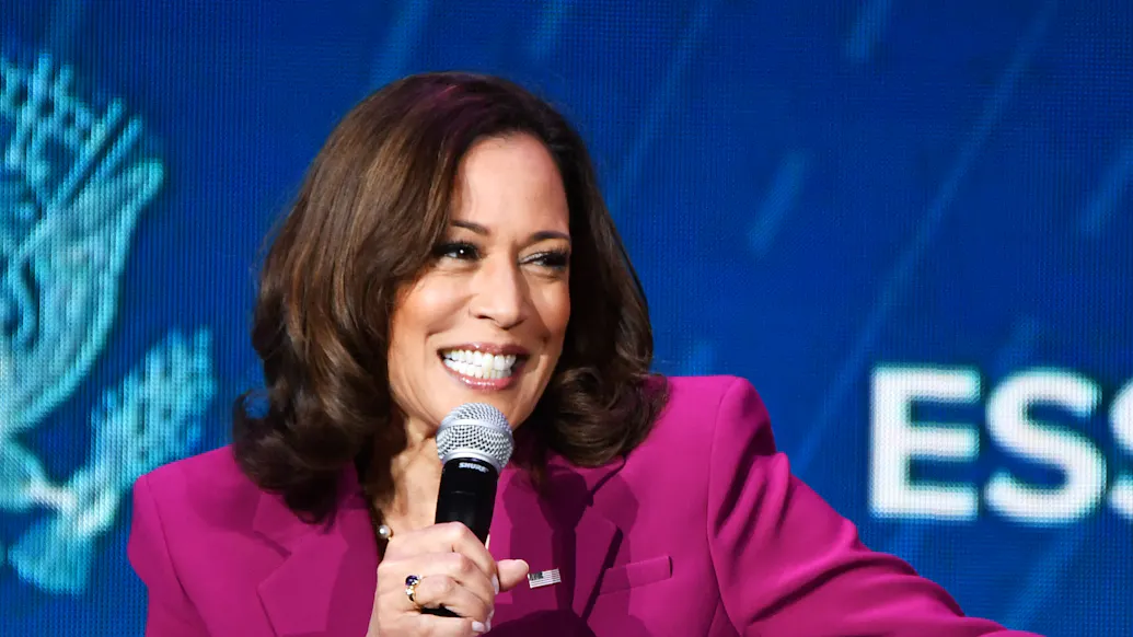What’s Wrong With This Picture? Giant Typo Looms Behind Kamala During Chat At New Orleans Culture Fest