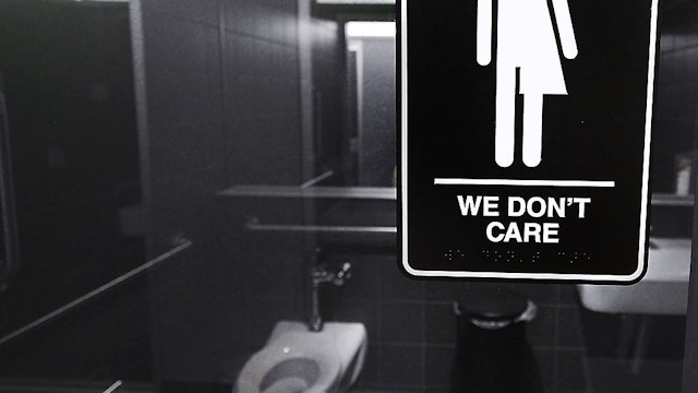 DURHAM, NC - MAY 10: Gender neutral signs are posted in the 21C Museum Hotel public restrooms on May 10, 2016 in Durham, North Carolina. Debate over transgender bathroom access spreads nationwide as the U.S. Department of Justice countersues North Carolina Governor Pat McCrory from enforcing the provisions of House Bill 2 that dictate what bathrooms transgender individuals can use. (Photo by Sara D. Davis/Getty Images)