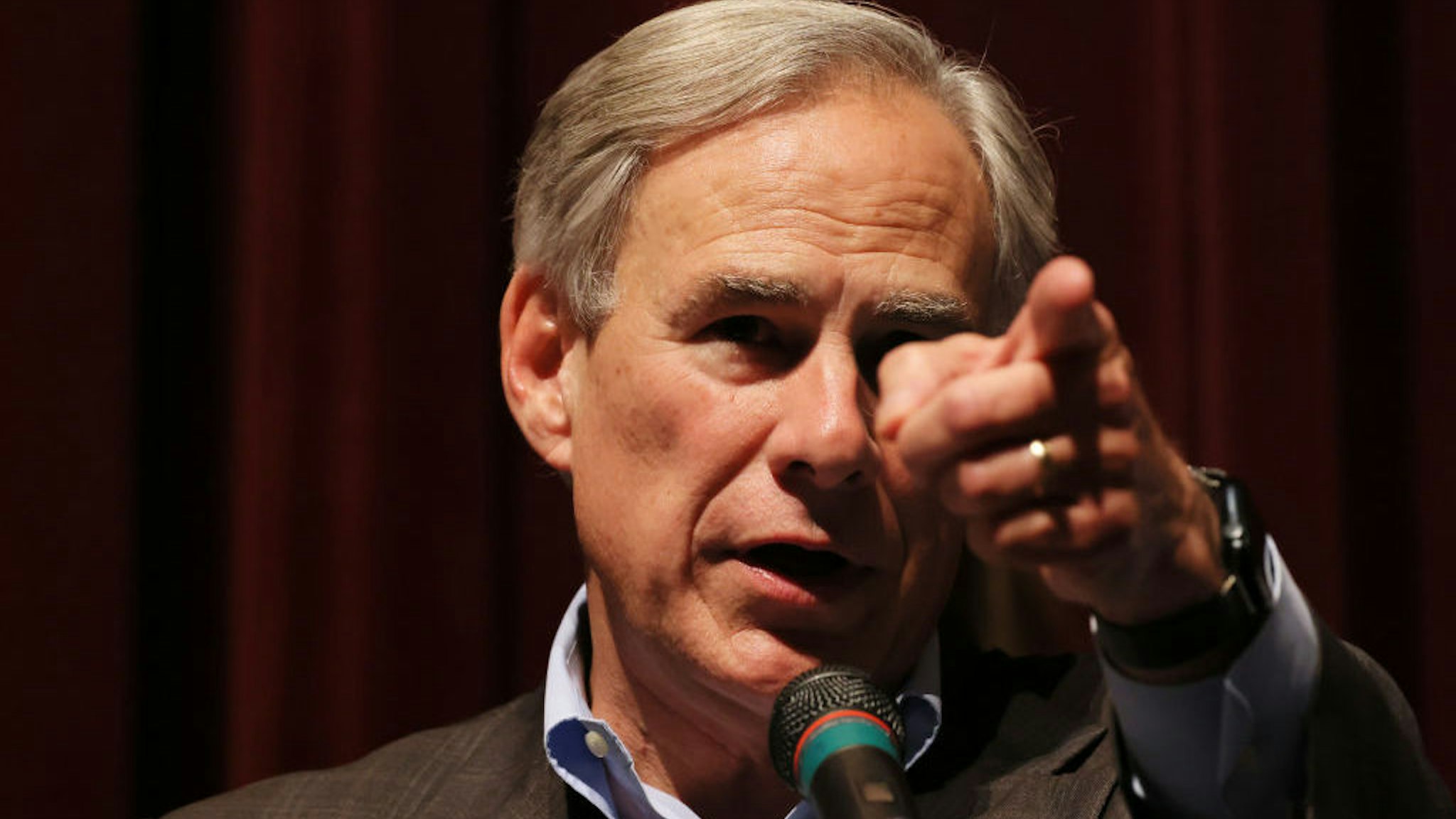 UVALDE, TEXAS - MAY 27: Governor Greg Abbott points to a reporter during a press conference about the mass shooting at Uvalde High School on May 27, 2022 in Uvalde, Texas. Abbott held a press conference to give an update on the resources the state will be providing to everyone affected by Tuesday's mass shooting where 19 children and two adults were killed at Robb Elementary School. Abbott expressed his anger about being misled about law enforcements response to the shooting. (Photo by Michael M. Santiago/Getty Images)