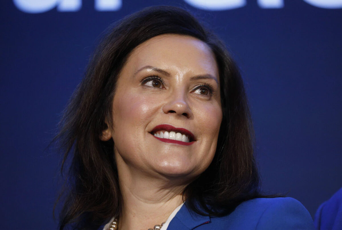 Michigan Gov. Gretchen Whitmer stands on stage at an event where General Motors announced that GMs Detroit-Hamtramck Assembly plant will build the all-electric Cruise Origin self-driving shuttle on January 27, 2020 in Hamtramck, Michigan