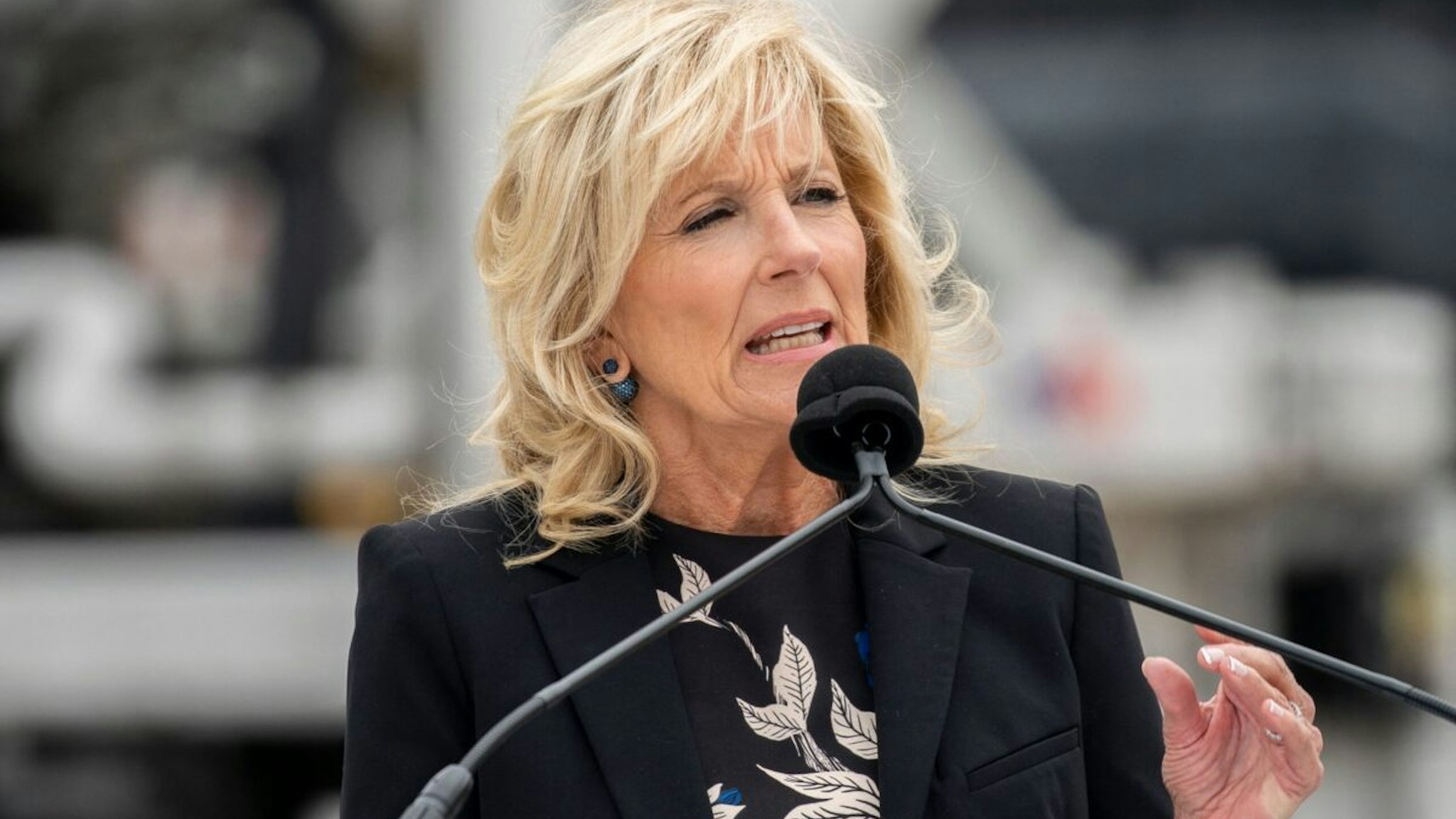 US First Lady Jill Biden delivers remarks after a shipment of infant formula, sent in through Operation Fly Formula, arrived at Dulles International Airport in Dulles, Virginia, on May 25, 2022.