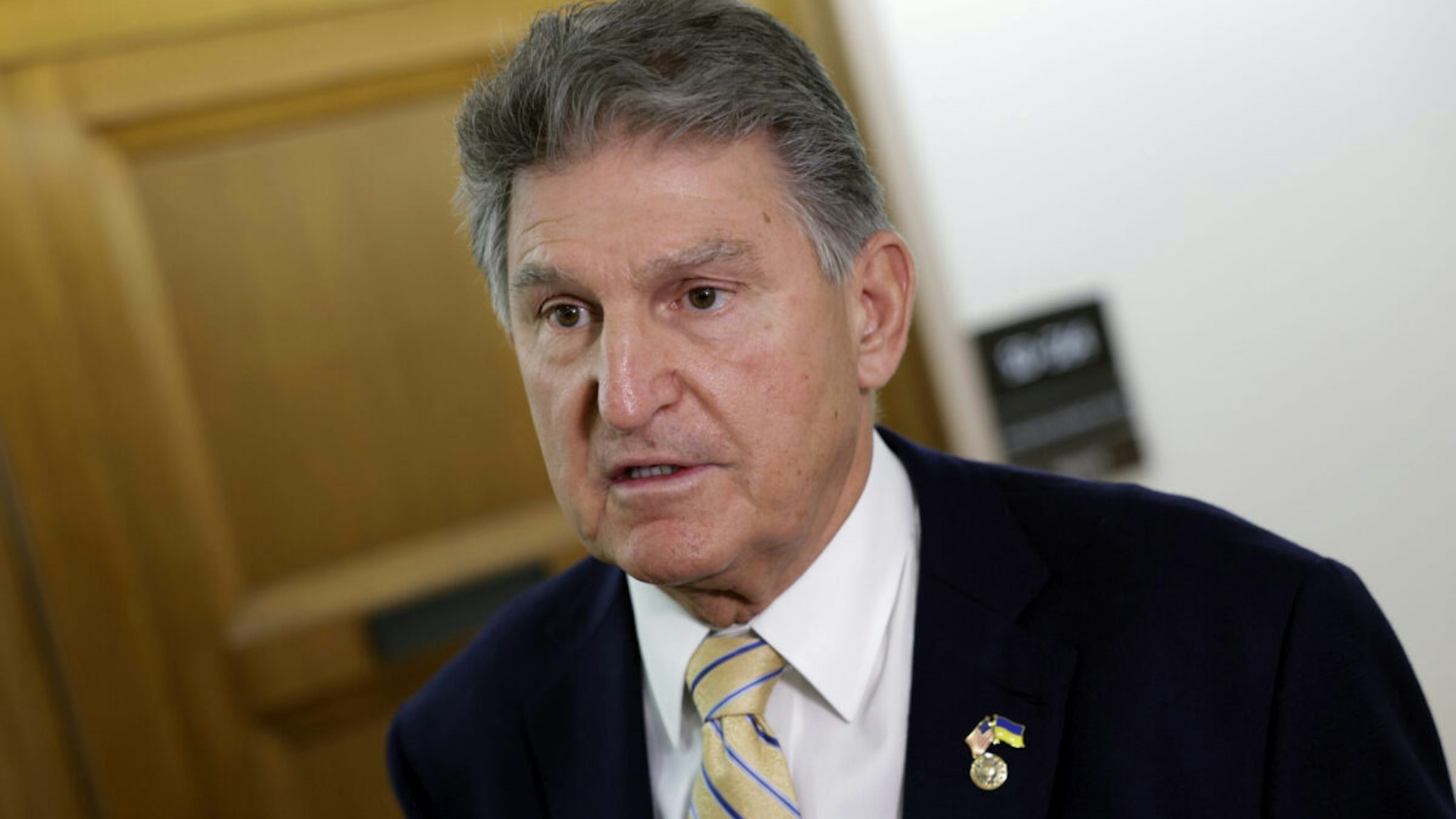 Sen. Joe Manchin (D-WV), Chairman of the Senate Energy and Natural Resources Committee, talks to reporters before a hearing with Interior Secretary Deb Haaland, at the Dirksen Senate Office Building on May 19, 2022 in Washington, DC