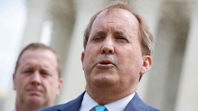 WASHINGTON, DC - APRIL 26: Texas Attorney General Ken Paxton (R) and Missouri Attorney General Eric Schmitt talk to reporters after the U.S. Supreme Court heard arguments in their case about Title 42 on April 26, 2022 in Washington, DC. Paxton and Schmitt, who is running for the U.S. Senate in Missouri, are suing to challenge the the Biden Administration's repeal of the Trump Migrant Protection Protocols—aka “Remain in Mexico.” (Photo by Chip Somodevilla/Getty Images)