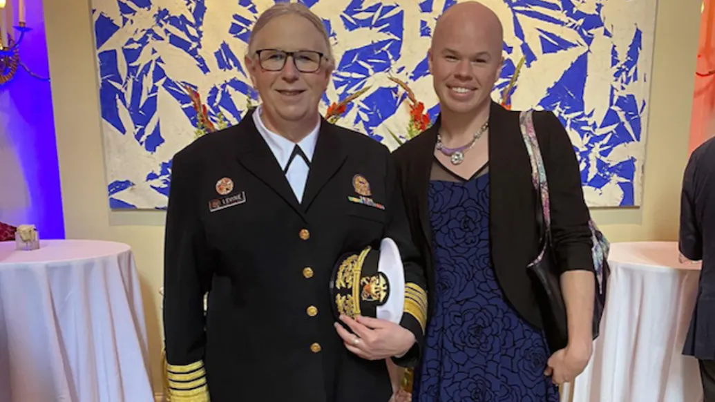 Biden’s Trans Health Official, ‘Non-Binary’ Puppy Fetish DOE Worker Make Splash At Ambassador’s Party