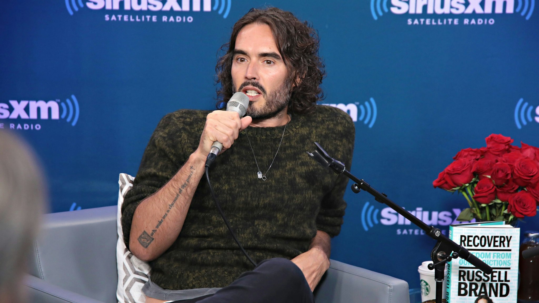 NEW YORK, NY - OCTOBER 04: SiriusXM host Jenny McCarthy sits down with Russell Brand for a Town Hall at SiriusXM Studios on October 4, 2017 in New York City.