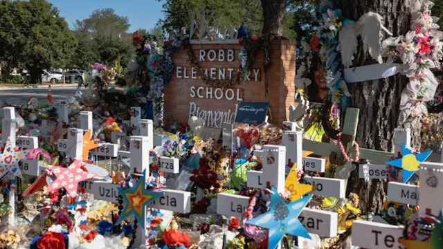 The memorial for the massacre at Robb Elementary School on June 24, 2022 in Uvalde, Texas. Nearly 300 Uvalde High School seniors received their diplomas one month to the day after nineteen children and two adults were killed at Robb Elementary School after a former student entered the school and barricaded himself in a classroom