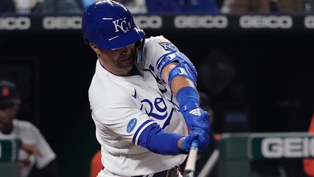 Whit Merrifield #15 of the Kansas City Royals hits an RBI single in the fourth inning against the Detroit Tigers at Kauffman Stadium on April 14, 2022 in Kansas City, Missouri.