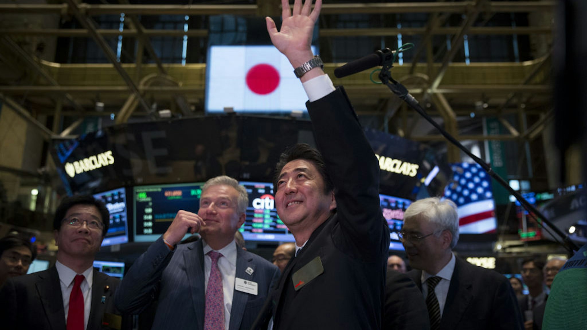 FILE: Shinzo Abe, Japan's prime minister, visits the trading floor at the New York Stock Exchange (NYSE) in New York, U.S., on Wednesday, Sept. 25, 2013. Abe Japan's longest-serving premier and a figure of enduring influence -- died after being shot at a campaign event on Friday. July 8, 2022, in an attack that shocked a nation where political violence and guns are rare.