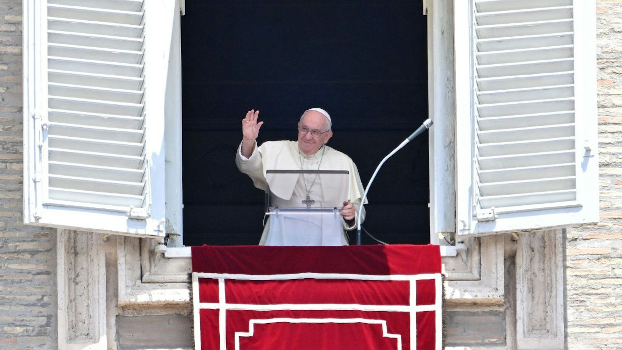 Pope Francis delivers the Sunday Angelus prayer from the window of his study overlooking St.Peter' Square at the Vatican on July 3, 2022.