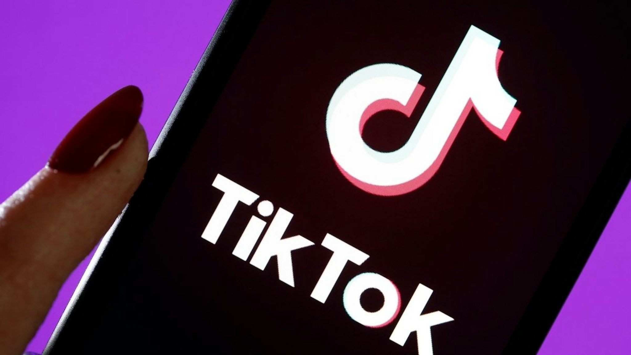 In this photo illustration, the social media application logo, Tik Tok is displayed on the screen of an iPhone on March 05, 2019 in Paris, France.