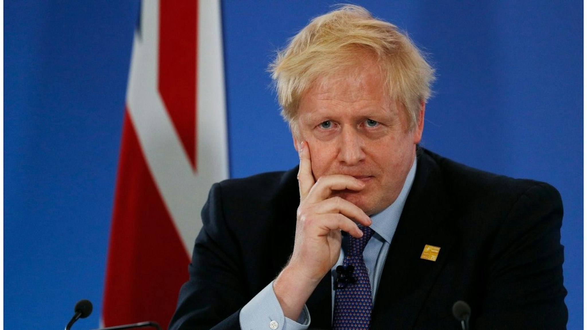 Britain's Prime Minister Boris Johnson gives a press conference at the NATO summit at the Grove hotel on December 4, 2019 in Watford, England.