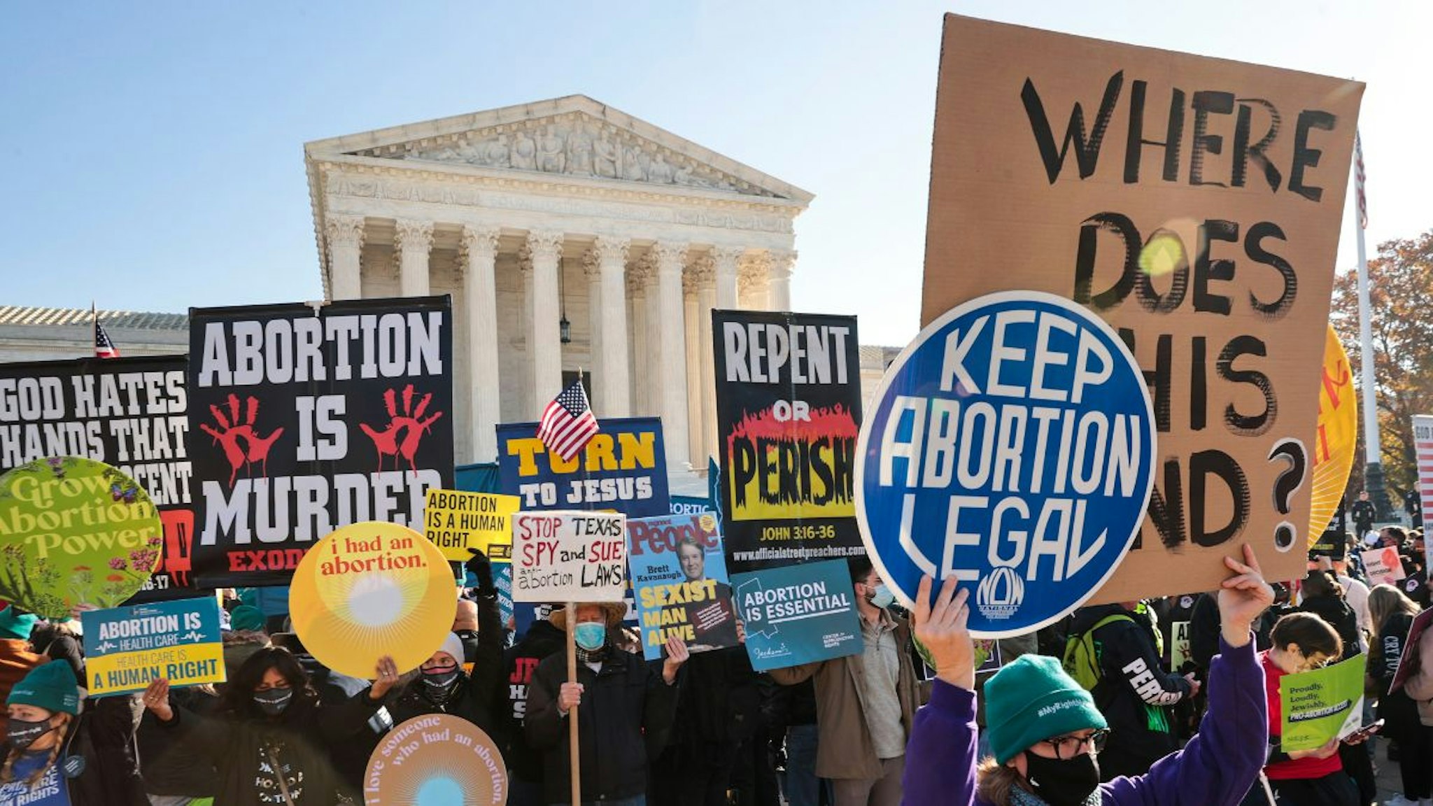 Demonstrators gather in front of the U.S. Supreme Court as the justices hear arguments in Dobbs v. Jackson Women's Health, a case about a Mississippi law that bans most abortions after 15 weeks, on December 01, 2021 in Washington, DC.