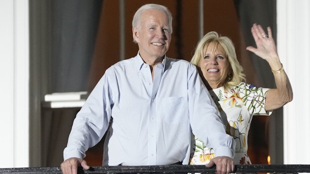 U.S. President Joe Biden and First Lady Jill Biden acknowledge attendees during a Fourth of July event on the South Lawn of the White House in Washington, D.C., US, on Monday, July 4, 2022.