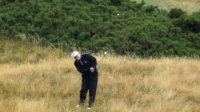 TURNBERRY, SCOTLAND - JULY 15: U.S. President Donald Trump plays a round of golf at Trump Turnberry Luxury Collection Resort during the U.S. President's first official visit to the United Kingdom on July 15, 2018 in Turnberry, Scotland. The President of the United States and First Lady, Melania Trump on their first official visit to the UK after yesterday's meetings with the Prime Minister and the Queen is in Scotland for private weekend stay at his Turnberry. (Photo by